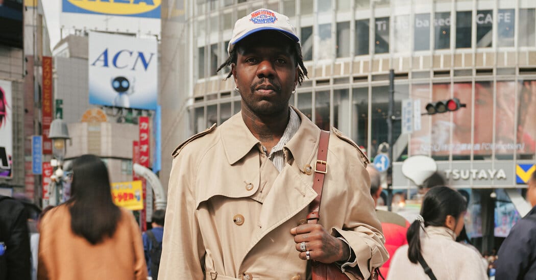 Kingsley Walters wears Baracuta trench at Shibuya Crossing — Static01.nyt.com