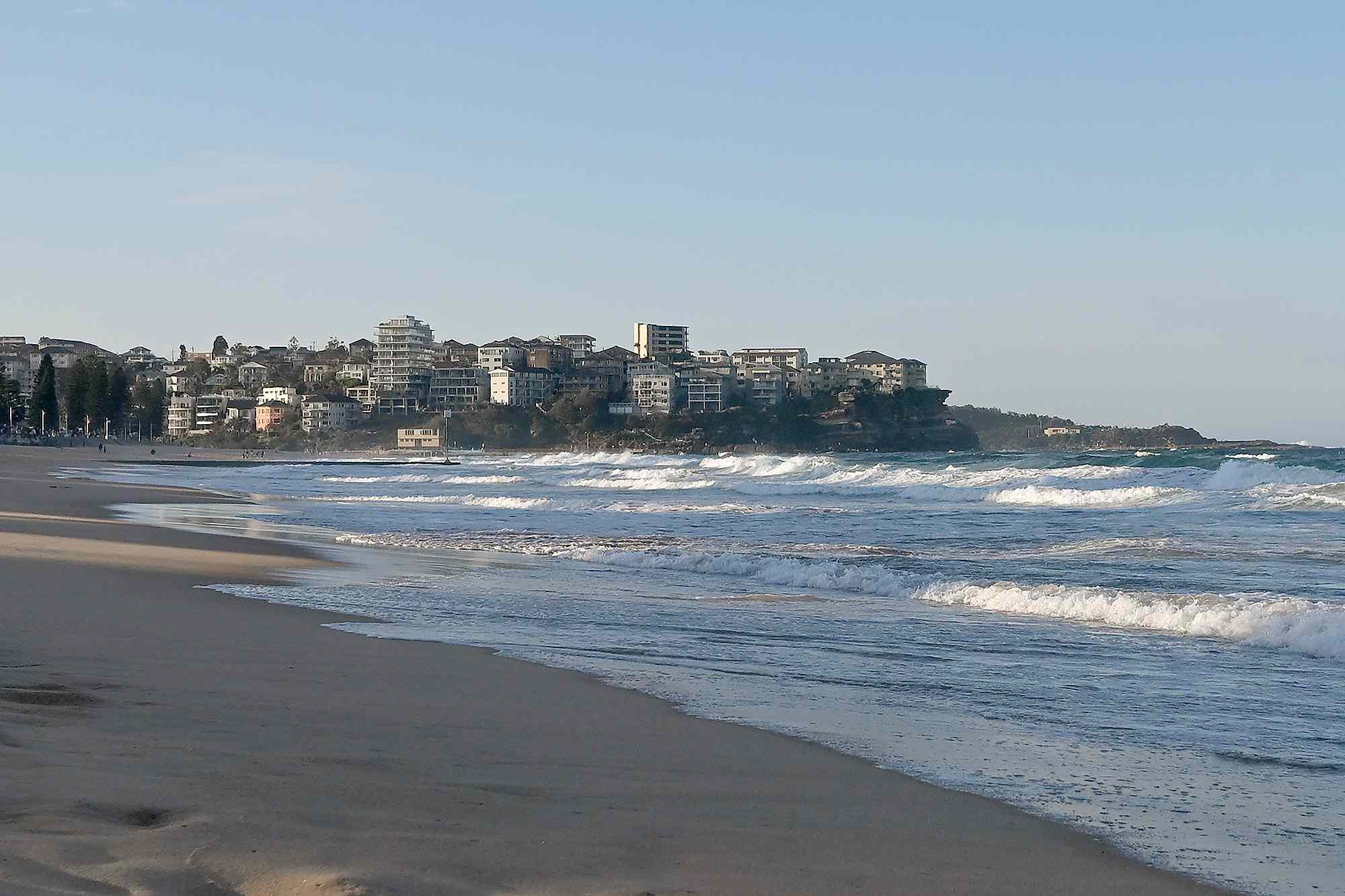 Surfer, 27, bitten at Manly Beach has part of lower leg amputated — People.com