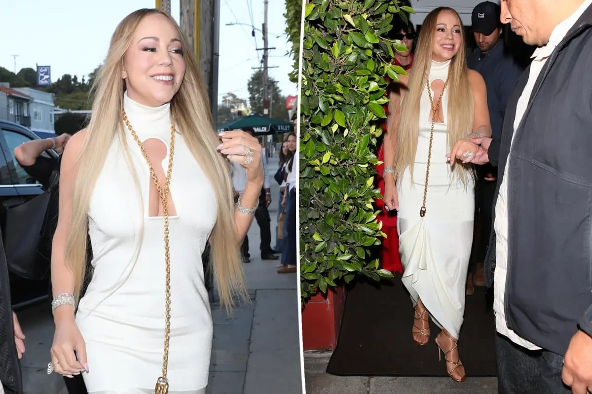 Mariah Carey uses a necklace to lift her Schiaparelli gown — Pagesix