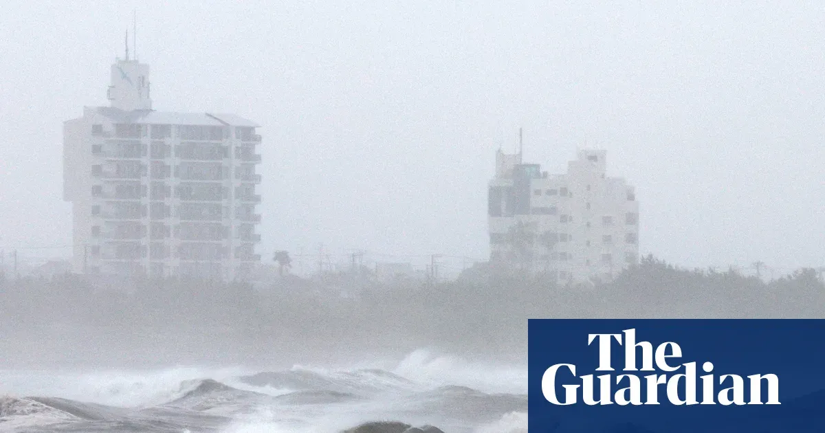Typhoon Jangmi sweeps northwards leaving 23 injured in Japan — World news | The Guardian