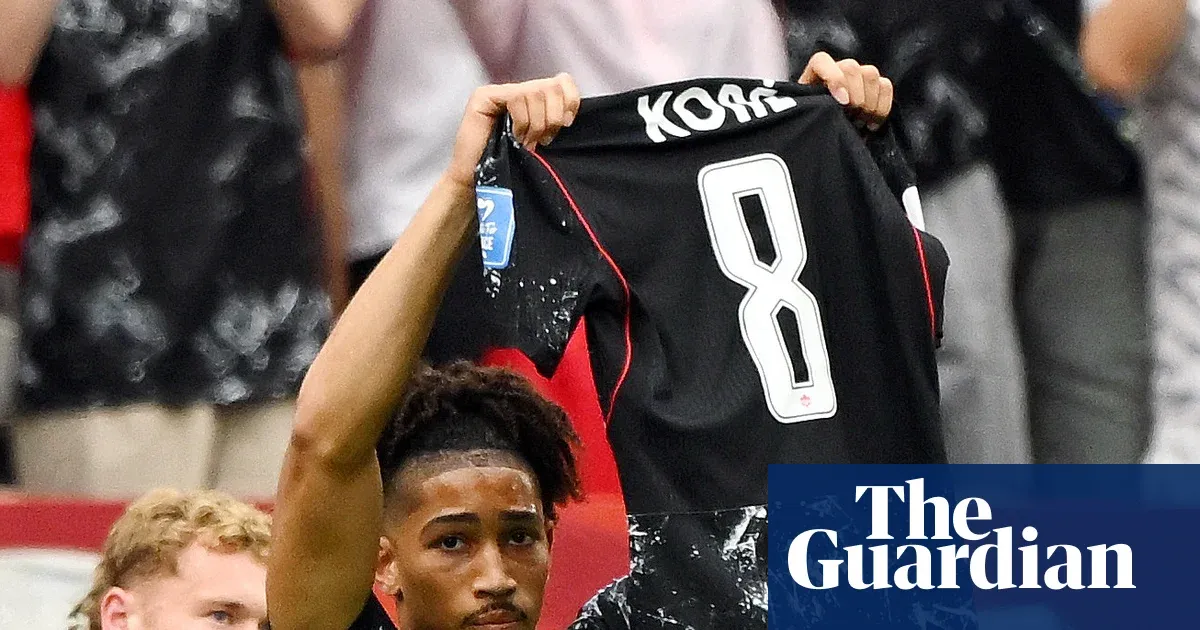 Canada routs nine-man Qatar as Koné injury mars first World Cup win — Football | The Guardian