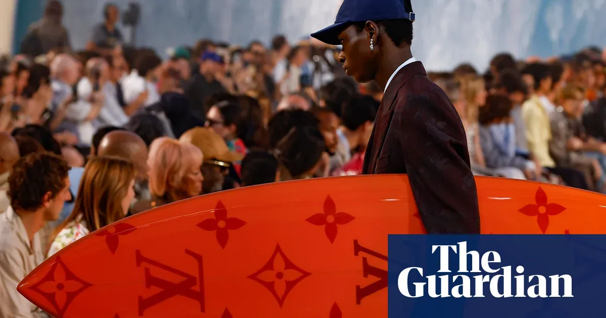 Louis Vuitton brings the beach to Paris in near 40C heat — Lifestyle | The Guardian