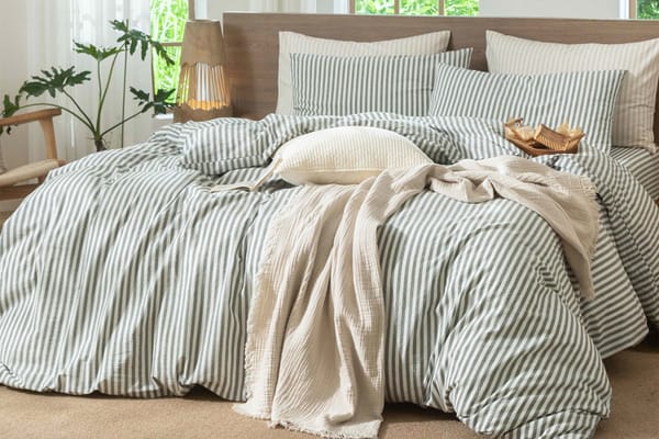 Reviewer praises MooMee striped duvet cover for cooler sleep and hotel look — People.com