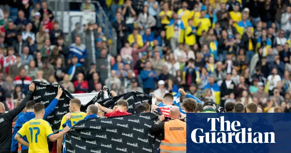 Christian Eriksen collapses during Denmark friendly — Football | The Guardian