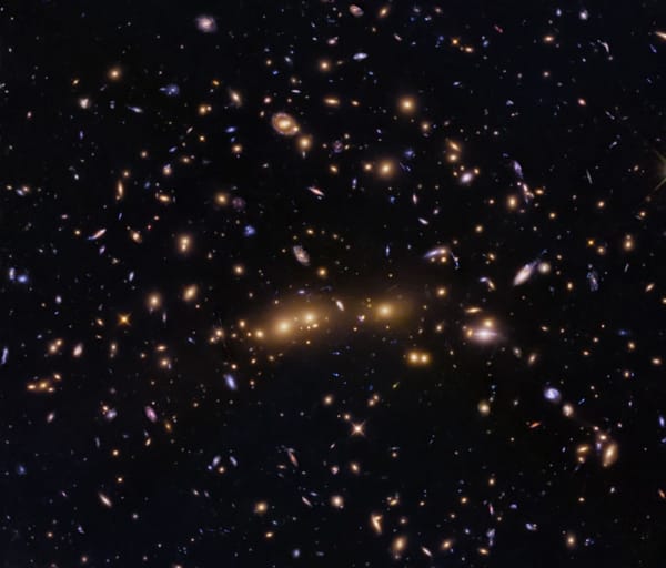 Hubble Glimpses Merging Galaxy Clusters — NASA Science