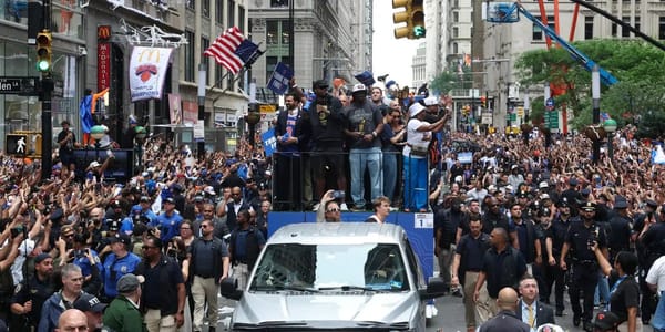 Knicks ticker-tape parade turns Financial District orange and blue — Businessinsider