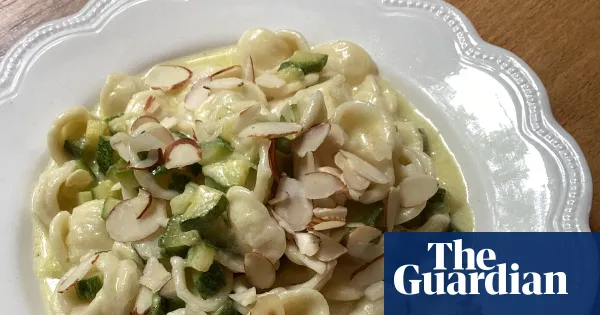 Rachel Roddy’s recipe for orecchiette with courgettes, parmesan cream and almonds — Lifestyle | The Guardian